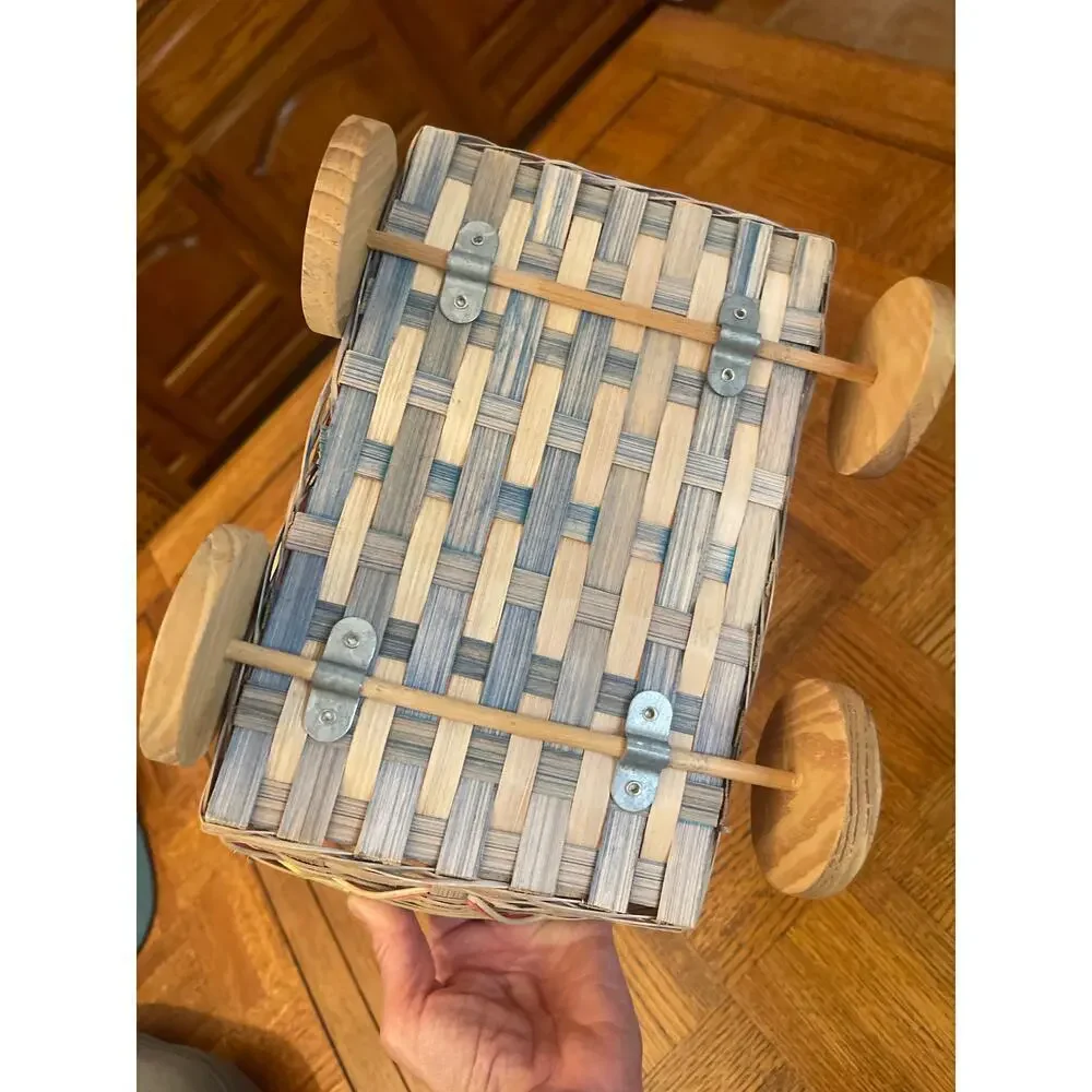Woven wicker Easter pushcart basket with wooden wheels